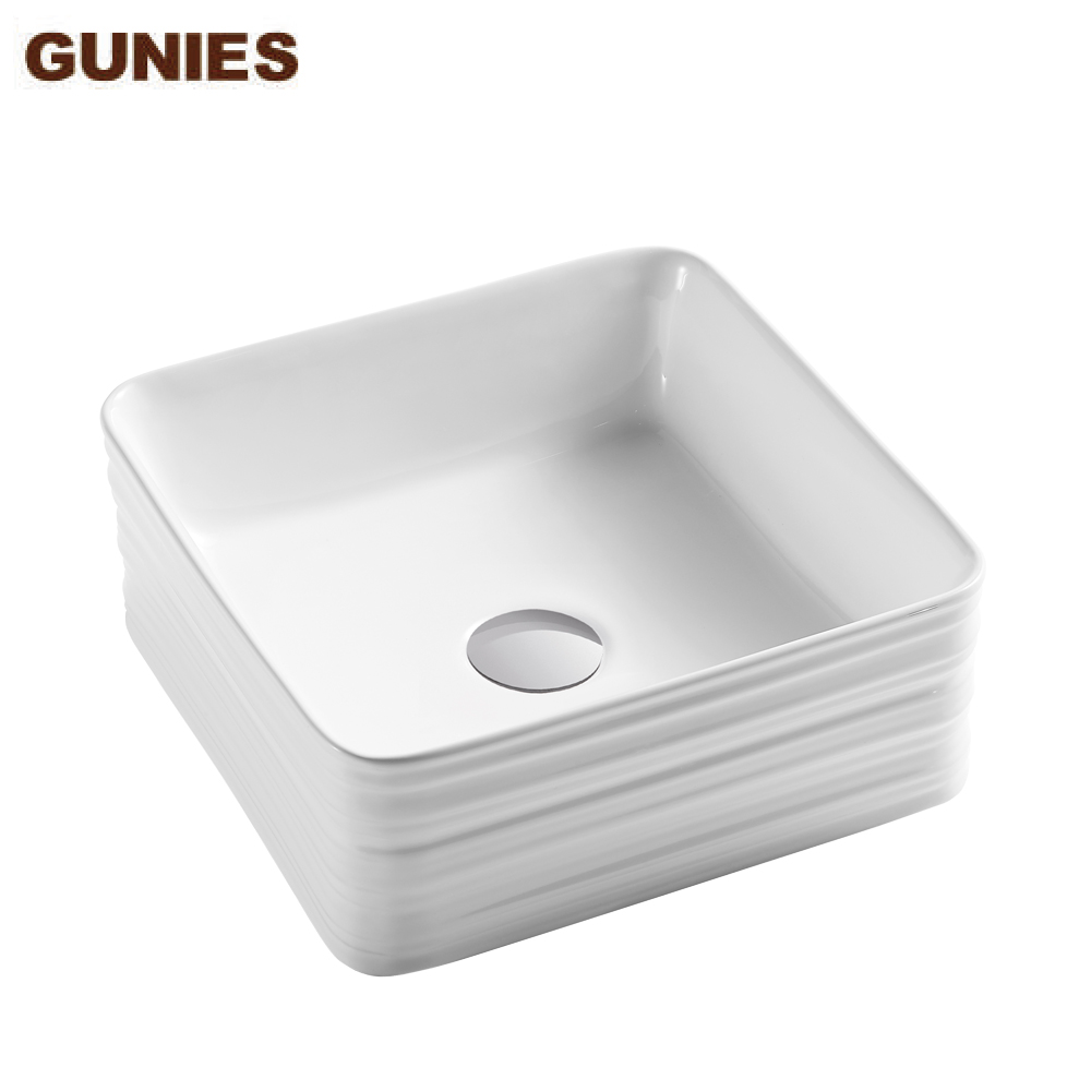 white ceramic square art basin with texture